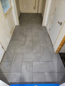 Hallway & Laundry Room Tile Installation – Holly Hill, Westport, MA