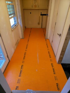 Hallway & Laundry Room Tile Installation – Holly Hill, Westport, MA